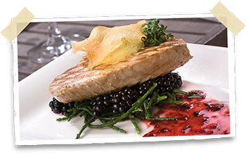 Blackberries and fish dish